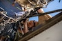 Marines assigned to the Marine Medium Tiltrotor Squadron 261 Reinforced conduct routine maintenance and daily inspections on a MV-22B Osprey on Camp Lemonnier, Djibouti, Jan. 17,  2024.