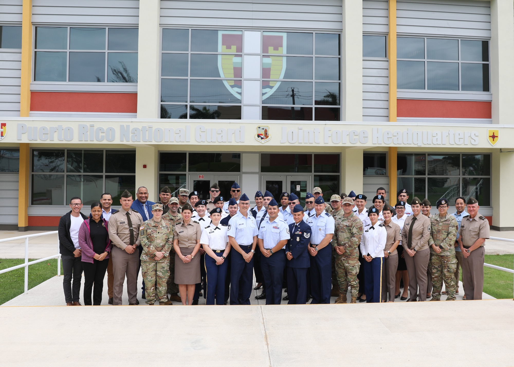 U.S. Soldiers, Airmen and civilians with the Puerto Rico National Guard pose for a group photo after completing a three-day joint protocol training conducted by the National Guard Bureau protocol office at Fort Buchanan, Bayamón, Puerto Rico, Feb. 27, 2025. More than 50 participants received 20 hours of classroom instruction, multiple scenario-based training exercises, and professional anecdotes covering several topics, including military and civilian distinguished visitor protocol, key leadership engagement management, military precedence rules, drafting invitations, the science of seating plans, flag protocol, budgeting, and protocol funding. (U.S. National Guard photo by Mr. Alexis Vélez)