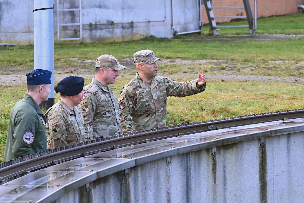 U.S. Air Force Staff Sgt. Ruben Carrasco, 52nd Civil Engineer Squadron water and fuel systems maintenance specialist, briefs 52nd Fighter Wing leadership on wastewater treatment operations at Spangdahlem Air Base, Germany, Feb. 28, 2025. The visit highlighted the base’s efforts to integrate nanobubble technology to enhance mission sustainability and compliance with environmental regulations. (U.S. Air Force photo by Senior Airman Darius Frazier)