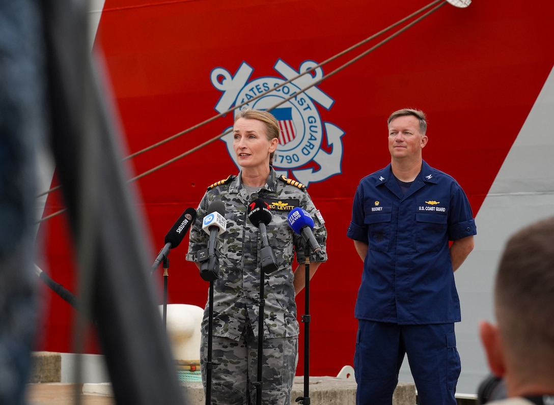 Coast Guard Capt. Matthew Rooney, the commanding officer of the Coast Guard Cutter Midgett (WMSL 757) and Royal Australian Navy Capt. Rebecca Levitt, the commanding officer of His Majesty’s Australian Ship Kuttabul, speak to the media in front of the Midgett in Sydney, Feb. 25, 2025. The United States’ alliance with Australia is strong and important; we have shared the same core values, beliefs, and goals through an alliance of more than 100 years. (U.S. Coast Guard photo by Petty Officer 3rd Class Jennifer Nilson)