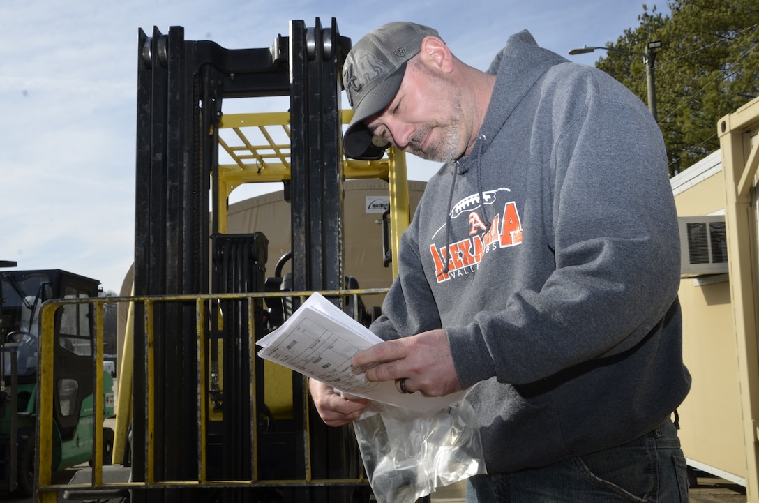 Man looking at paperwork