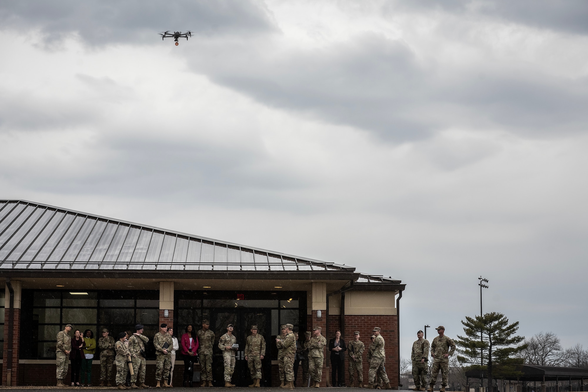 U.S. Air Force Gen. Johnny Lamontagne, commander of Air Mobility Command, and others watch an unmanned aircraft system (UAS) demonstration by Airmen assigned to the 87th Civil Engineer Group at Joint Base McGuire-Dix-Lakehurst, N.J., Feb. 27, 2025. A cornerstone of Lamontagne’s visit was his focus on Airmen and their development, emphasizing the significance of accountability, leadership empowerment and resilience in maintaining a mission-ready force. (U.S. Air Force photo by Staff Sgt. Austin Knox)