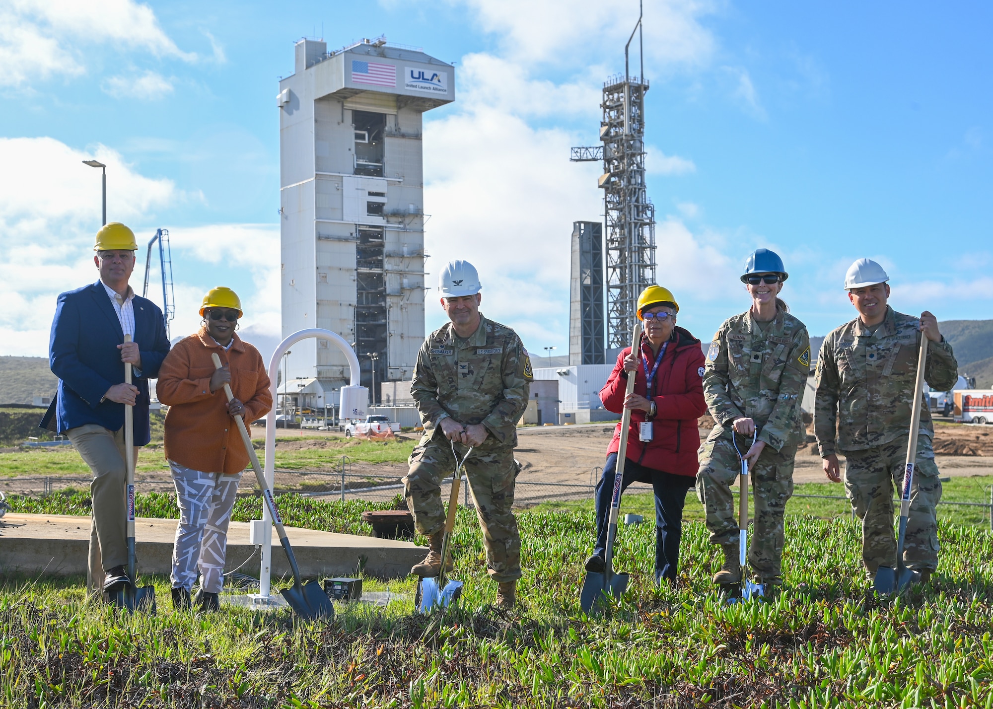 vandenberg members with shovels and hard hats at space launch complex 3 ready to dig at a groundbreaking ceremony