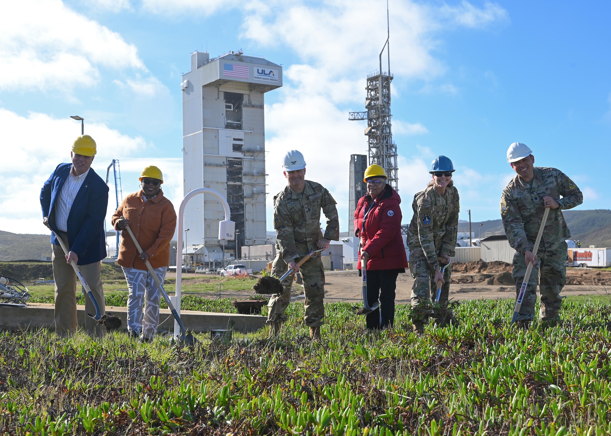 vandenberg members with shovels and hard hats at space launch complex 3 ready to dig at a groundbreaking ceremony