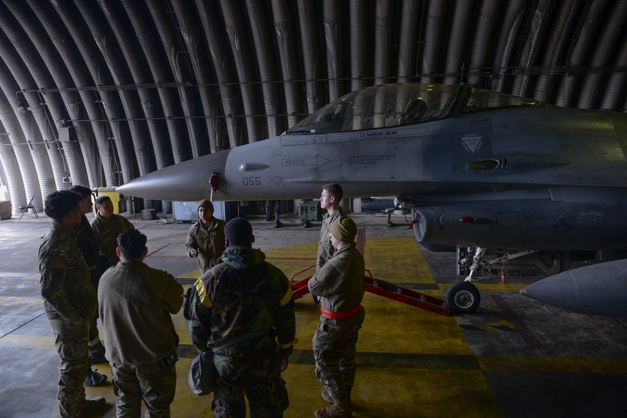U.S. Air Force Airmen assigned to the 51st Maintenance Group learn how to rapidly decontaminate an F-16 Fighting Falcon assigned to the 36th Fighter Squadron at Osan Air Base, Republic of Korea, Feb. 28, 2025. The 51st MXG regularly executes this training prior to wing-wide exercises to hone readiness and ensure the safety of maintenance Airmen in the event of a chemical, biological, radiological, or nuclear exposure. (U.S. Air Force photo by Staff Sgt. Kahdija Slaughter)