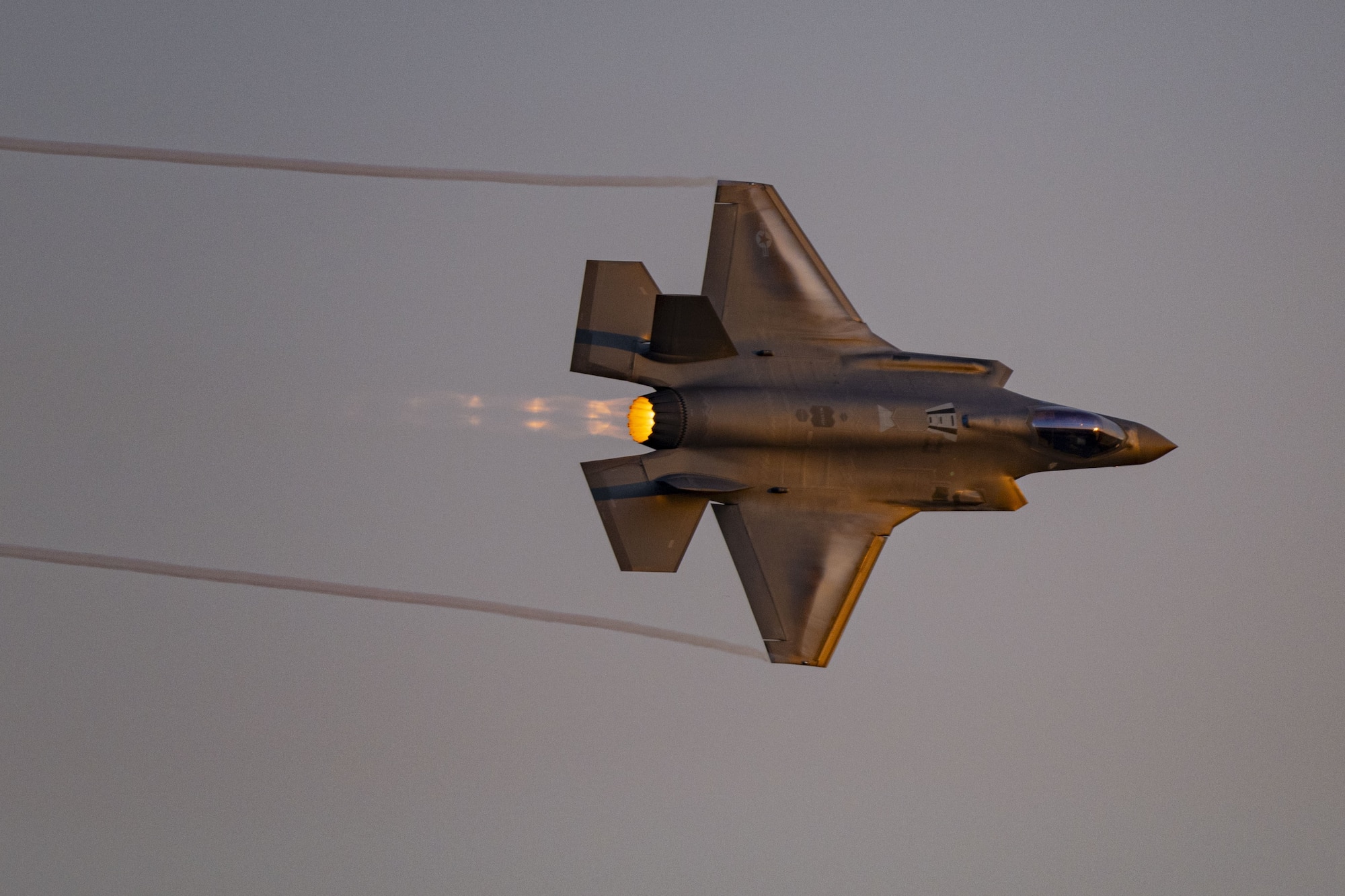 A F-35 Lightning II aircraft in the sky.