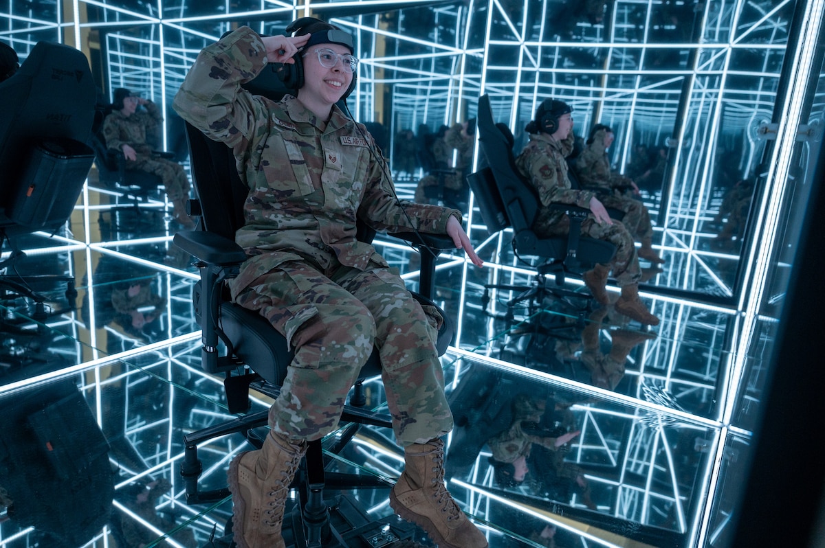 U.S. Air Force Staff Sgt. Kaylin Cornell, a fitness assessment cell manager assigned to the 673d Force Support Squadron, sits in the MindGym at Joint Base Elmendorf-Richardson, Alaska, Feb. 26, 2025. The MindGym is a facility designed to bolster mental resilience and cognitive performance for service members and their families by offering a sensory-controlled environment where users engage in guided mindfulness sessions. (U.S. Air Force photo by Airman 1st Class Hunter Hites)