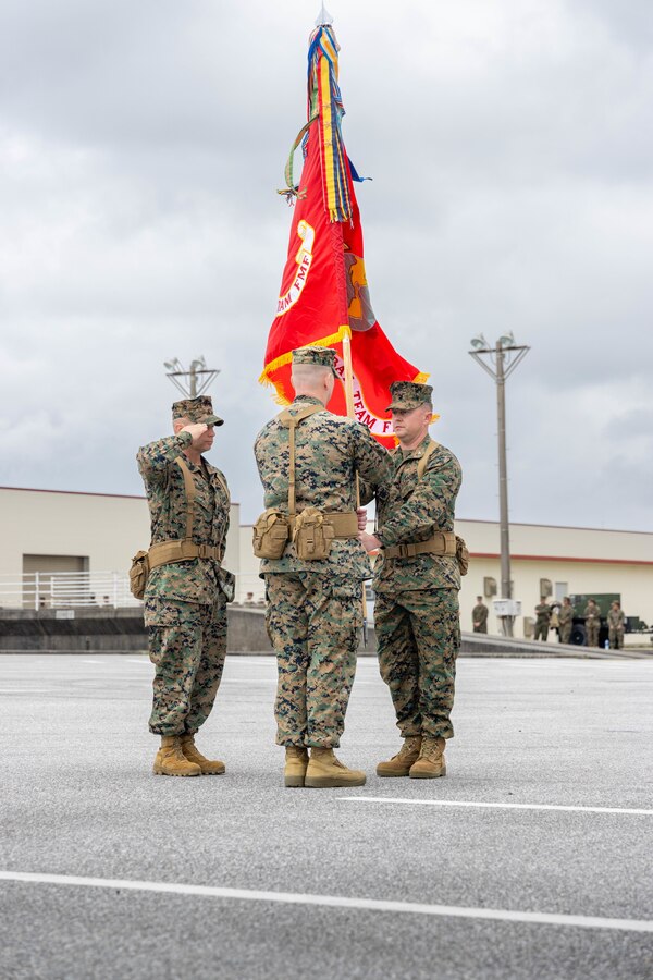 U.S. Marine Corps Col. Peter Eltringham, right, passes the 12th Littoral Combat Teams colors to Lt. Col. Jacob Godby during the designation ceremony of 12th LCT on Camp Hansen Okinawa, Japan, March 3, 2025. During the ceremony, 12th Marine Littoral Regiment welcomed its third and final subordinate element, 12th LCT. The establishment of this renowned unit strengthens the MLR's ability to integrate sensing, fires, and maneuver to support maritime campaigns and reinforces the Marine Corps’ commitment to countering evolving threats in the Indo-Pacific. Eltringham, a native of Rhode Island is the commanding officer of 12th MLR and Godby, a native of Virginia, is the commanding officer of 12th LCT, 12th MLR, 3d Marine Division. (U.S. Marine Corps photo by Staff Sgt. JVonnta Taylor)