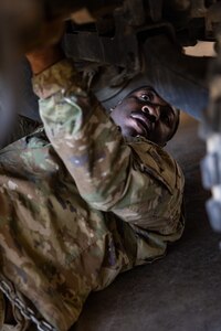 Oklahoma Army National Guard member Sgt. Daevon Newton, a mechanic with a team from Field Maintenance Shop Six, inspects a humvee during the Mechanic of the Year competition held at the Combined Support Maintenance Shop in Norman, Oklahoma, Feb. 26, 2025. The Guardsmen came together for the fourth annual competition, teaming up to showcase their mechanic skills and connect with fellow competitors.(Oklahoma National Guard photo by Spc. Danielle Rayon)