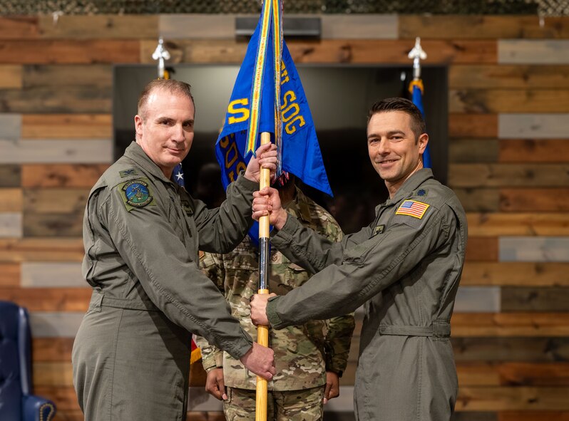 Col. Matthew Barry, 919th Special Operations Group commander, gives command of the 2nd Special Operations Squadron to Lt. Col. James LaDuke during a change of command ceremony. The 2nd Special Operations Squadron is one of the oldest units in the Air Force.