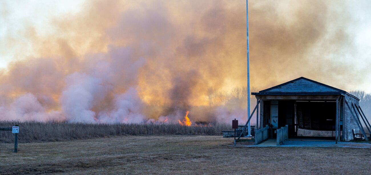 Firefighters from Joint Base McGuire-Dix-Lakehurst and Wright-Patterson Air Force Base conduct a prescribed burn of Huffman Prairie on March 2, 2025.