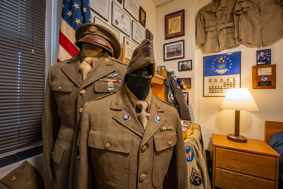 Vintage military uniforms and memorabilia on display