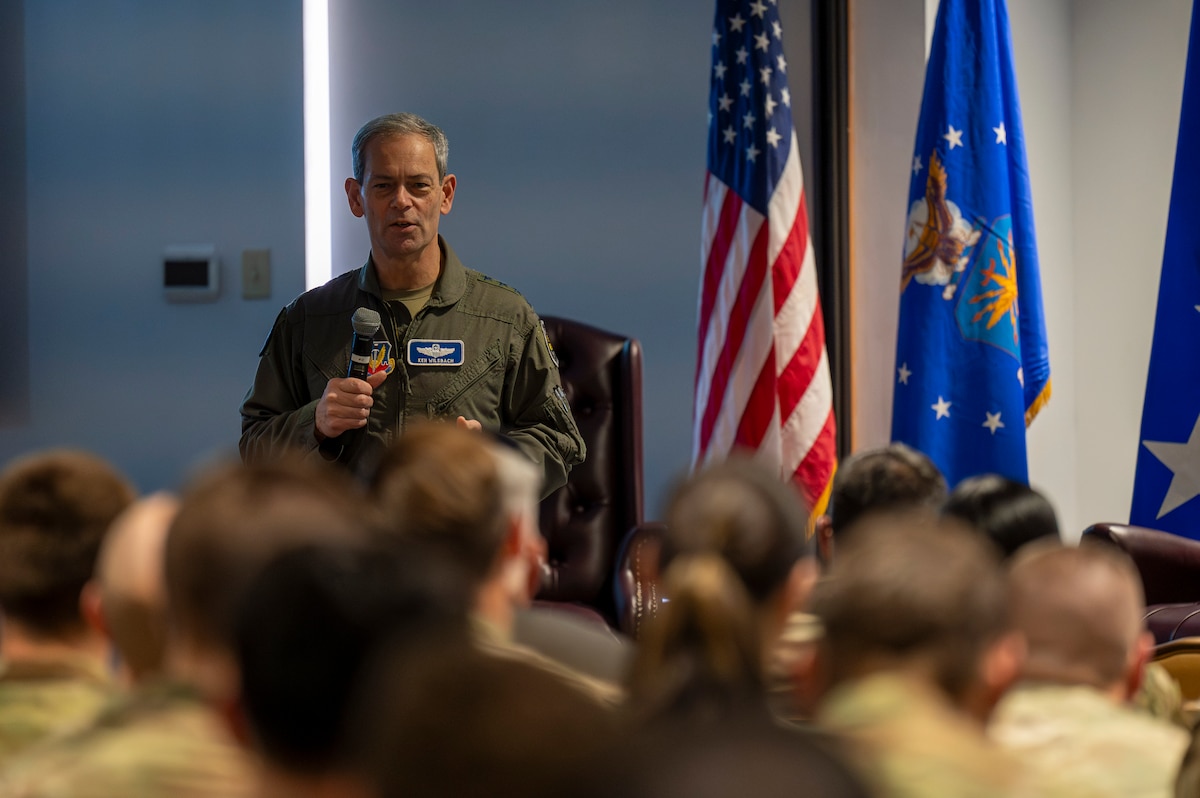 U.S. Air Force Gen. Ken Wilsbach, commander of Air Combat Command, addresses the audience at an all call at Davis-Monthan Air Force Base, Arizona, Feb. 27, 2025. Wilsbach briefed the Airmen on his priorities for ACC and took questions from the audience. (U.S. Air Force photo by Senior Airman Devlin Bishop)