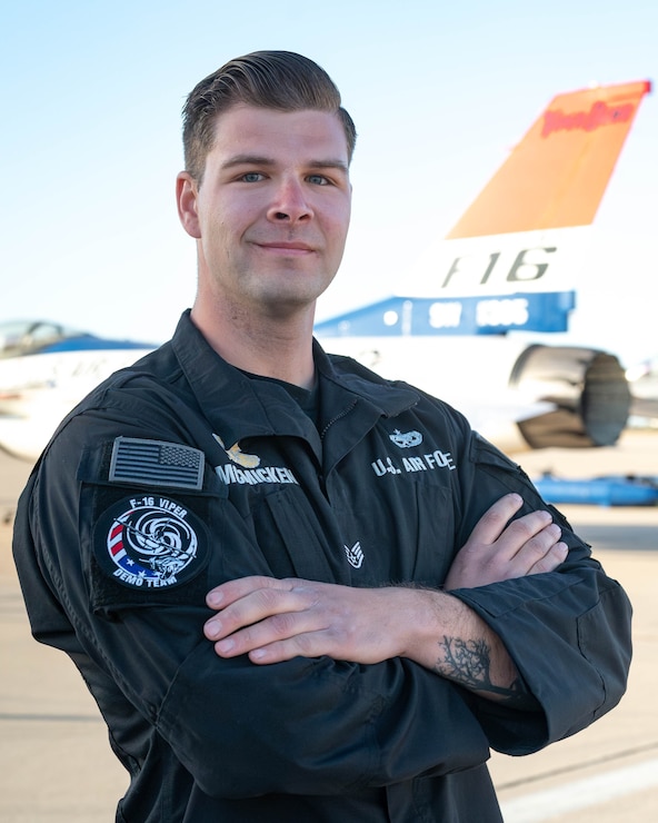 A member of the F-16 Viper Demonstration Team poses for a photo.