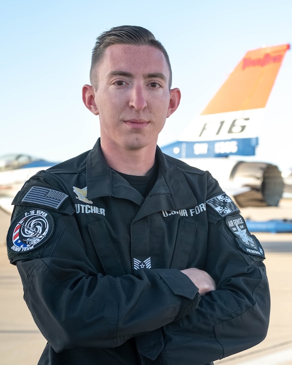 A member of the F-16 Viper Demonstration Team poses for a photo.