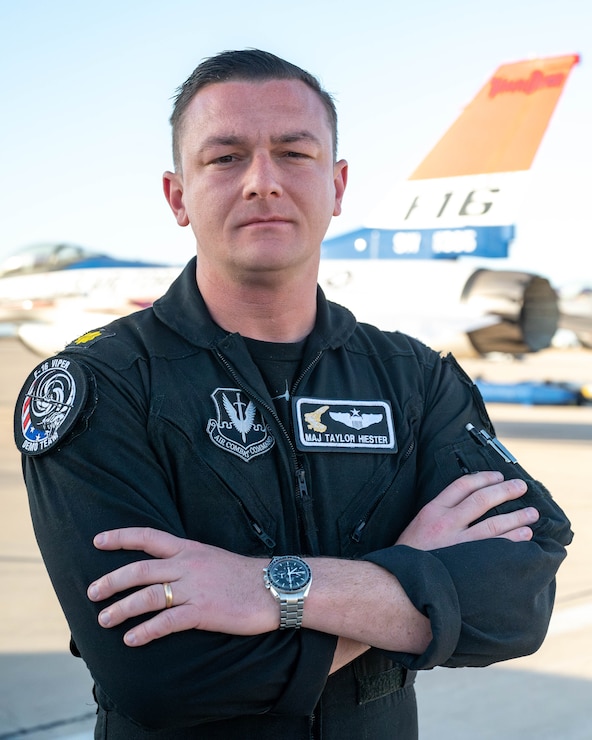 A member of the F-16 Viper Demonstration Team poses for a photo.