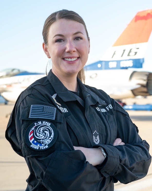 A member of the F-16 Viper Demonstration Team poses for a photo.