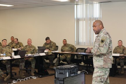 Chief Warrant Officer 5 Lashon White, Command Chief Warrant Officer, U.S. Army Reserve Command, talks with command team members about the importance of the Army Reserve mission and continued training during the 85th U.S. Army Reserve Support Command’s annual Battalion Command Teams Training event, held February 28 – March 2, 2025.