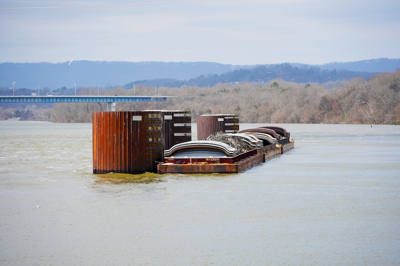 Three barges are tied up at the mooring cells downstream from Chickamauga Lock in Chattanooga, Tennessee.