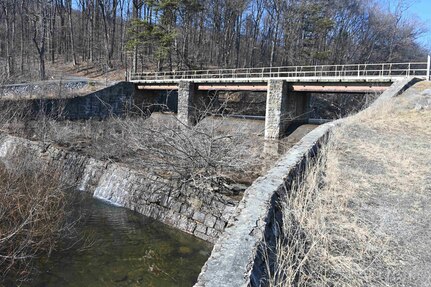 The Marquette Lake dam spillway, pictured here on March 3, 2025, will be replaced and the bridge over the spillway will be removed during an upcoming construction project. (Pennsylvania National Guard photo by Brad Rhen)