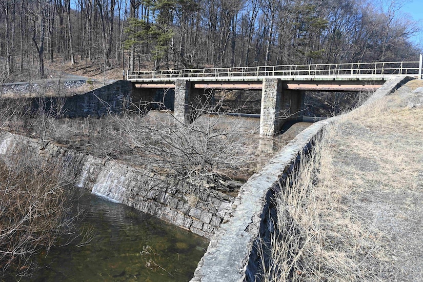 The Marquette Lake dam spillway, pictured here on March 3, 2025, will be replaced and the bridge over the spillway will be removed during an upcoming construction project. (Pennsylvania National Guard photo by Brad Rhen)