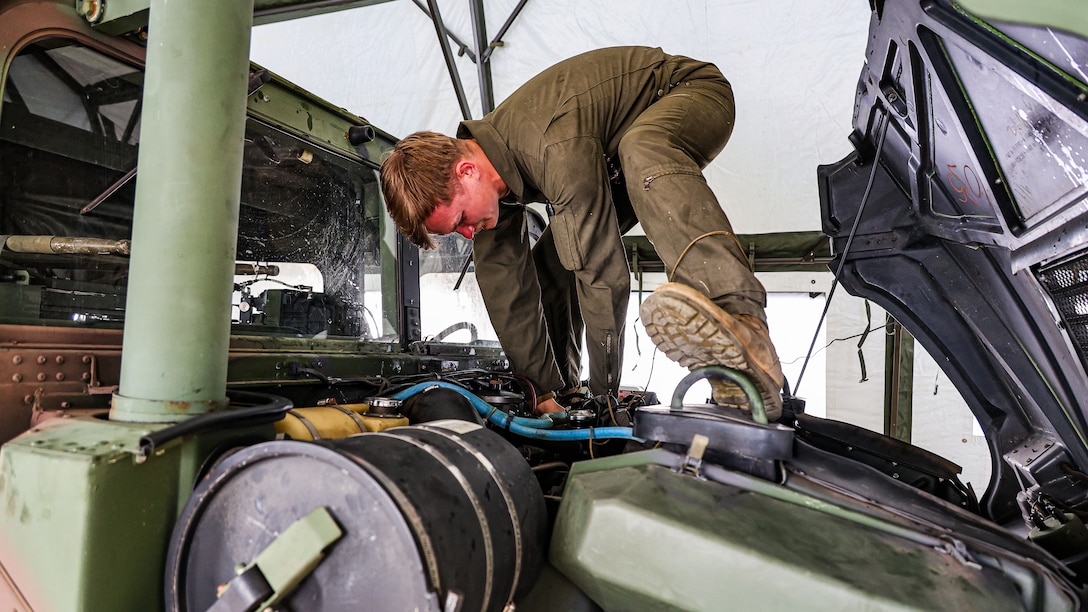 U.S. Marine Corps Cpl. Wyatt Potts, utilities systems technician with 3rd Maintenance Battalion, 3rd Marine Logistics Group, III Marine Expeditionary Force, performs maintenance on Maritime Prepositioning Force motor transport equipment Feb. 25 during Freedom Banner 25 at the Chinhae Naval Ammunition Pier, Republic of Korea Naval Base Chinhae, South Korea. (Official U.S. Marine Corps Photo/Cpl. Nicholas Martinez)
