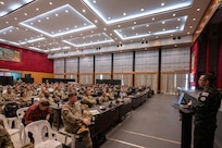 Staff officers from more than 25 nations gathered in an auditorium to be briefed about the scenario that will play out for Exercise Cobra Gold 2025 in Camp Suranaree, Thailand, Feb. 26, 2025.