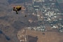 Air Commandos from the 353rd Special Operations Wing perform a military free-fall near Lop Buri, Thailand, Feb. 27, 2025, during Exercise Cobra Gold.