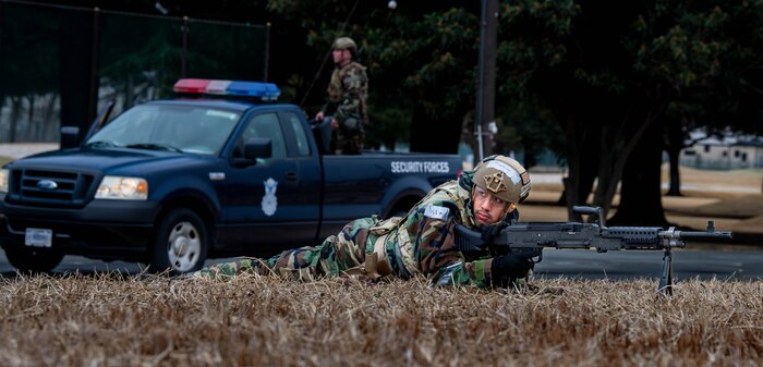 U.S. Air Force Defenders assigned to the 374th Security Forces Squadron secure a perimeter.