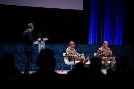 Military members speak at a panel.