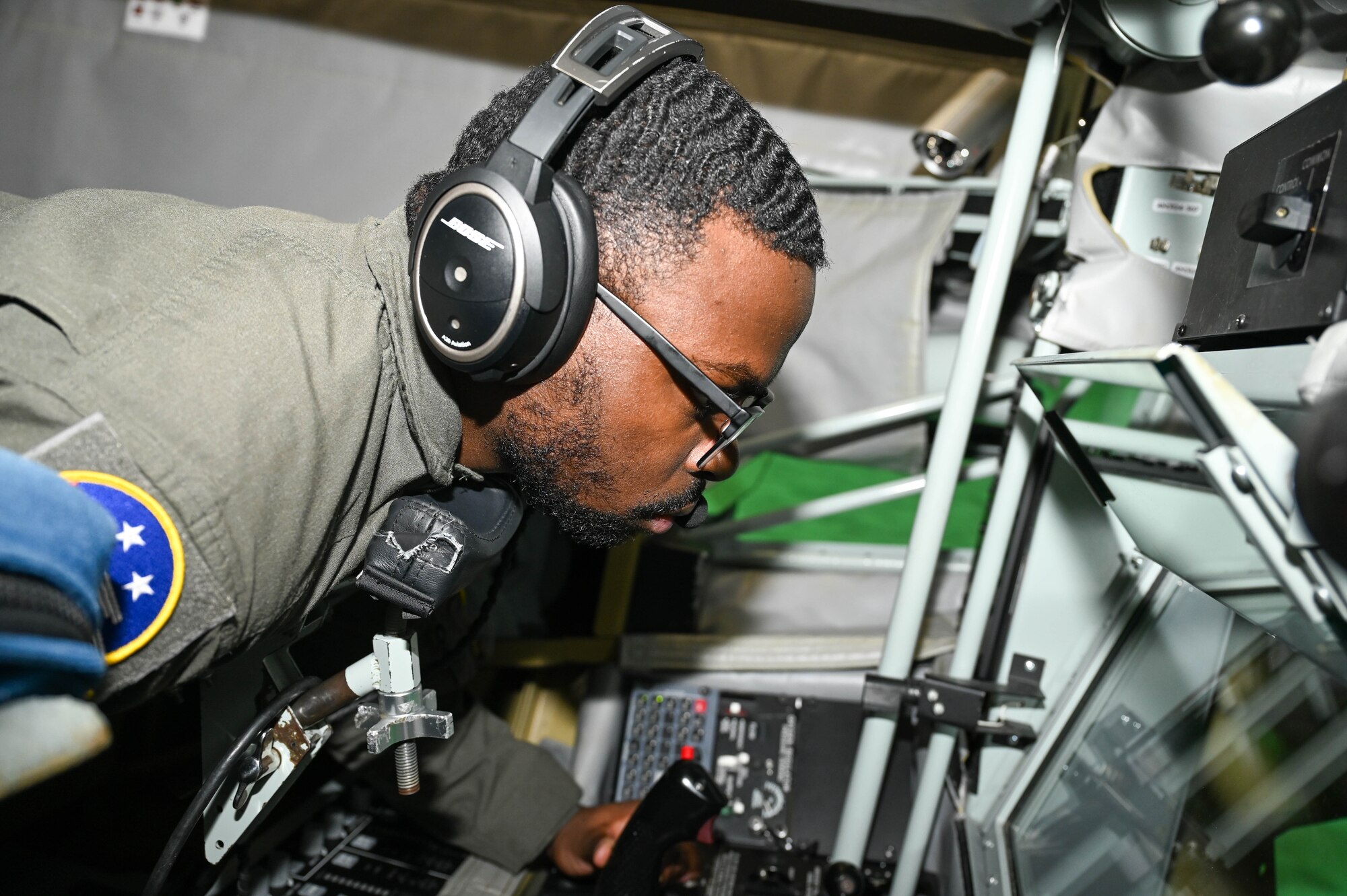 U.S. Air Force Staff Sgt. Jaden Allen operates a KC-135 boom simulator at Altus Air Force Base, Oklahoma, March 5, 2025. Allen has been a boom operator instructor since May 2023. (U.S. Air Force photo by Senior Airman Kari Degraffenreed)