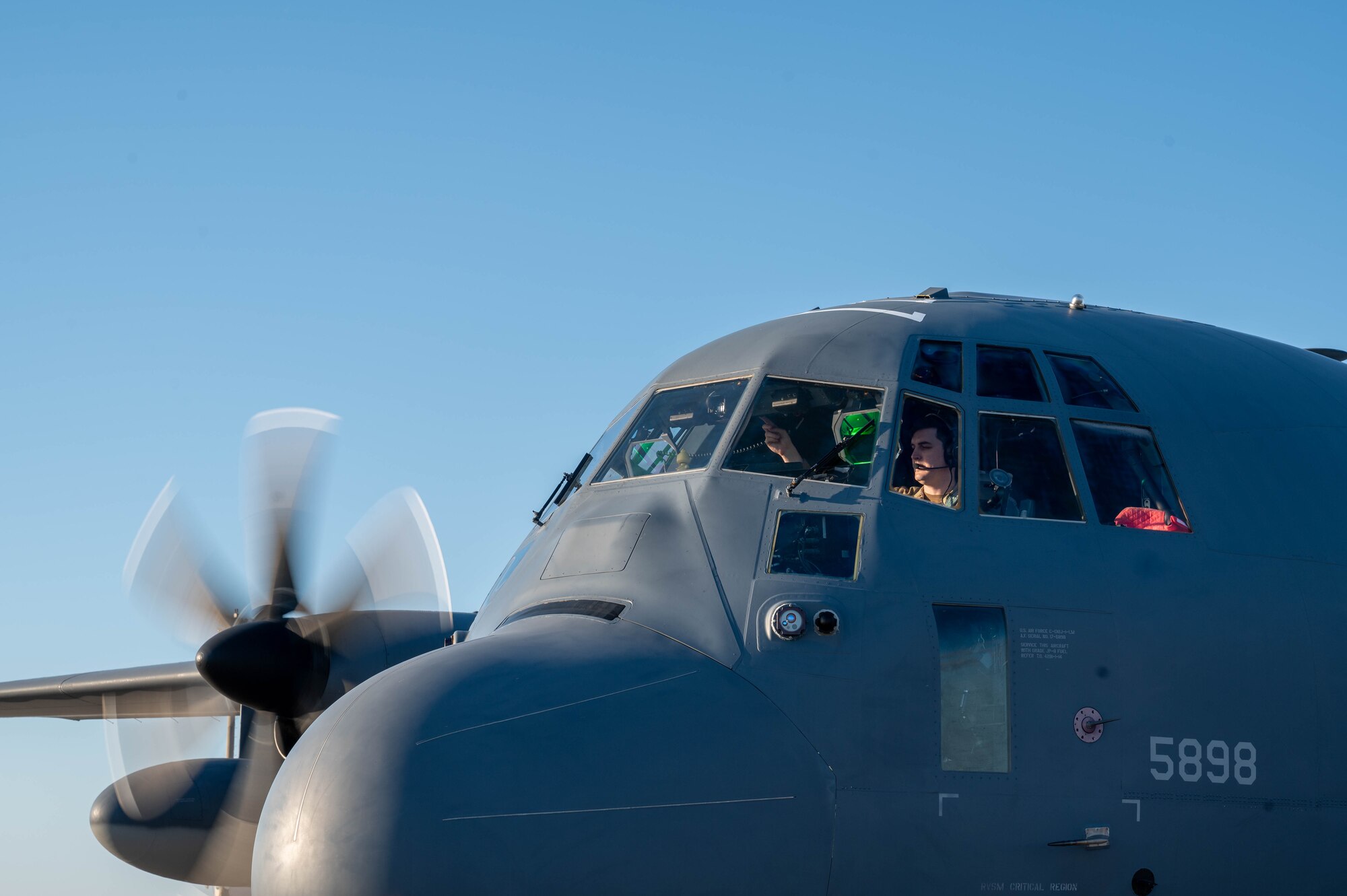 A pilot for the 39th Rescue Squadron starts the engines of an HC-130J Combat King II aircraft prior to takeoff from Patrick Space Force Base, Fla., Feb. 26, 2025. Citizen Airmen from the 920th Aeromedical Staging Squadron, alongside joint and international partners, honed their medical and patient evacuation skills during hands-on training, reinforcing en route patient staging capabilities and wartime medical operations. (U.S. Air Force photo by Tech. Sgt. Kristen Pittman)