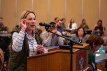 A participant asks a question during a town hall at Misawa Air Base, Japan, March 5, 2025.