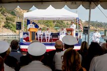 240809-N-SS900-1136 SAN DIEGO (Aug. 9, 2024) Capt. Kenneth Douglas speaks during a change of command ceremony for Commander Submarine Squadron (COMSUBRON) 11 held aboard Los Angeles-class fast-attack submarine USS Hampton (SSN 767) at Naval Base Point Loma, Aug. 9, 2024. During the ceremony, Capt. William Wiley relieved Douglas as commander of COMSUBRON 11. (U.S. Navy photo by Mass Communication Specialist 1st Class Aaron T. Smith)