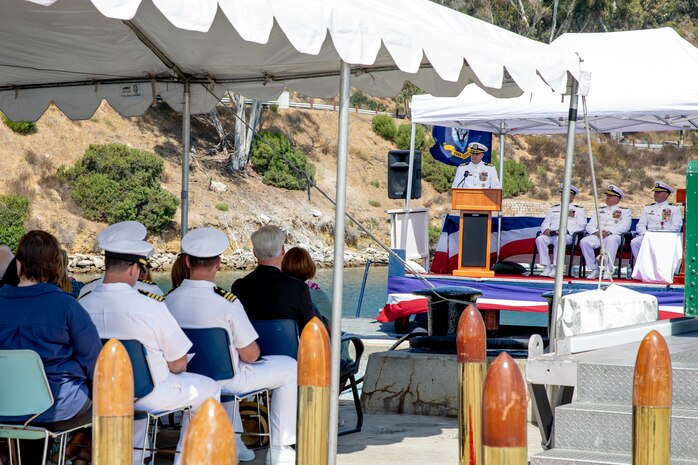 240809-N-SS900-1216 SAN DIEGO (Aug. 9, 2024) Capt. William Wiley speaks during a change of command ceremony for Commander Submarine Squadron (COMSUBRON) 11 held aboard Los Angeles-class fast-attack submarine USS Hampton (SSN 767) at Naval Base Point Loma, Aug. 9, 2024. During the ceremony, Wiley relieved Capt. Kenneth Douglas as commander of COMSUBRON 11. (U.S. Navy photo by Mass Communication Specialist 1st Class Aaron T. Smith)