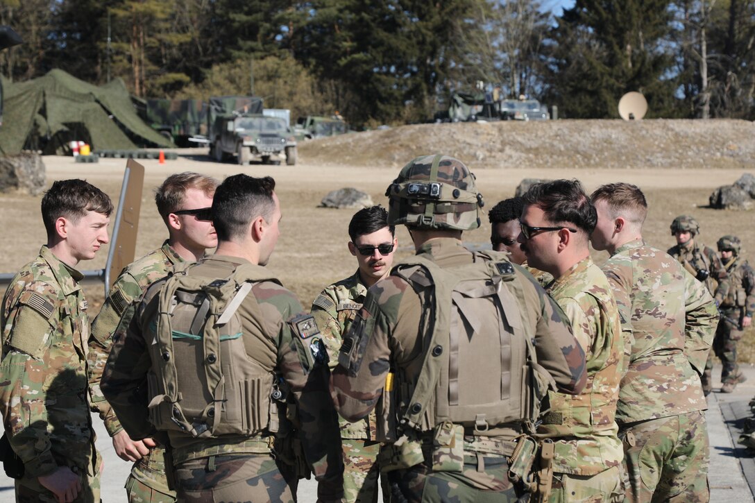 Discussing the Eurocopter Tiger helicopter during Allied Spirit 25