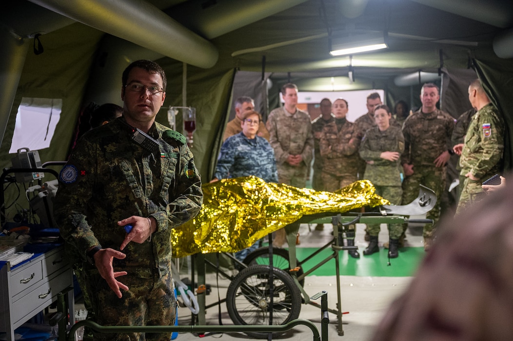 Bulgarian Armed Forces Senior Lieutenant Georgi Valentinov Semovski, assistant professor in the military toxicology section department of disaster medicine, briefs Bulgarian Multilateral Medical Simulation Training Engagement participants during a walkthrough at the Military Medical Simulation Center in Sofia, Bulgaria, Feb. 24, 2025.