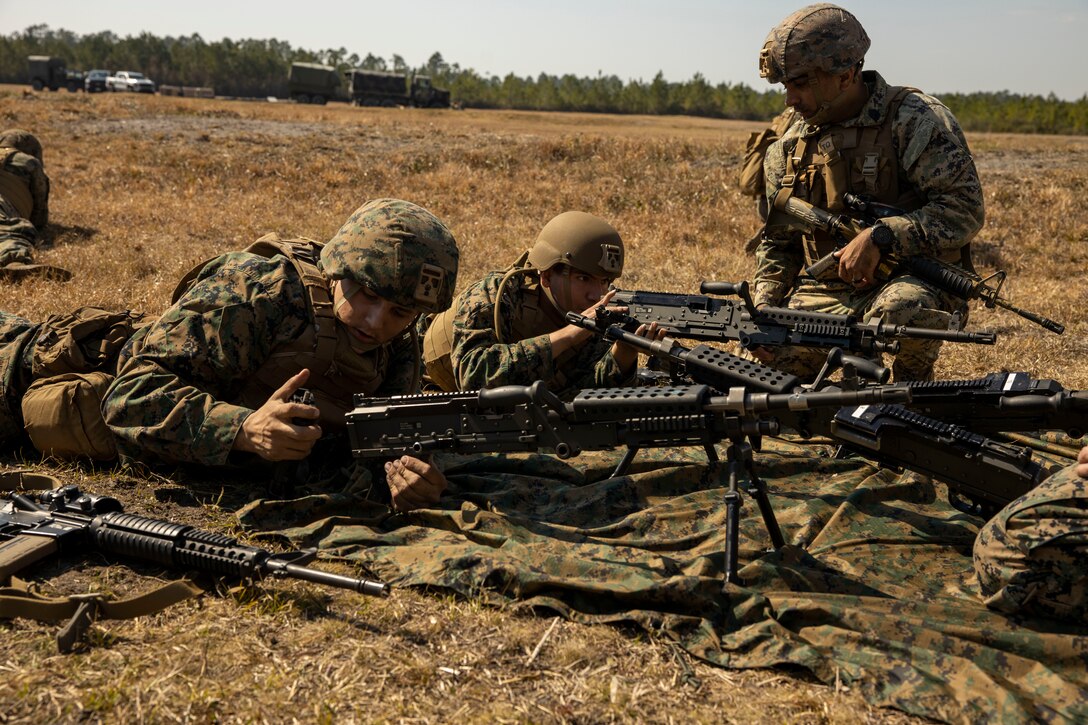 U.S. Marines with 8th Communication Battalion, II Marine Expeditionary Force Information Group, disassemble M240B machine guns during a battalion mission readiness exercise MRX at Marine Corps Base Camp Lejeune, North Carolina, Feb. 27, 2025. MRX is an opportunity to train and evaluate 8th Communication Battalion’s ability to complete special individual and collective tasks and evaluate their ability to conduct assigned mission essential tasks in order to prepare those forces to deploy worldwide in support of II MEF. (U.S. Marine Corps photo by Cpl. Marc Imprevert)