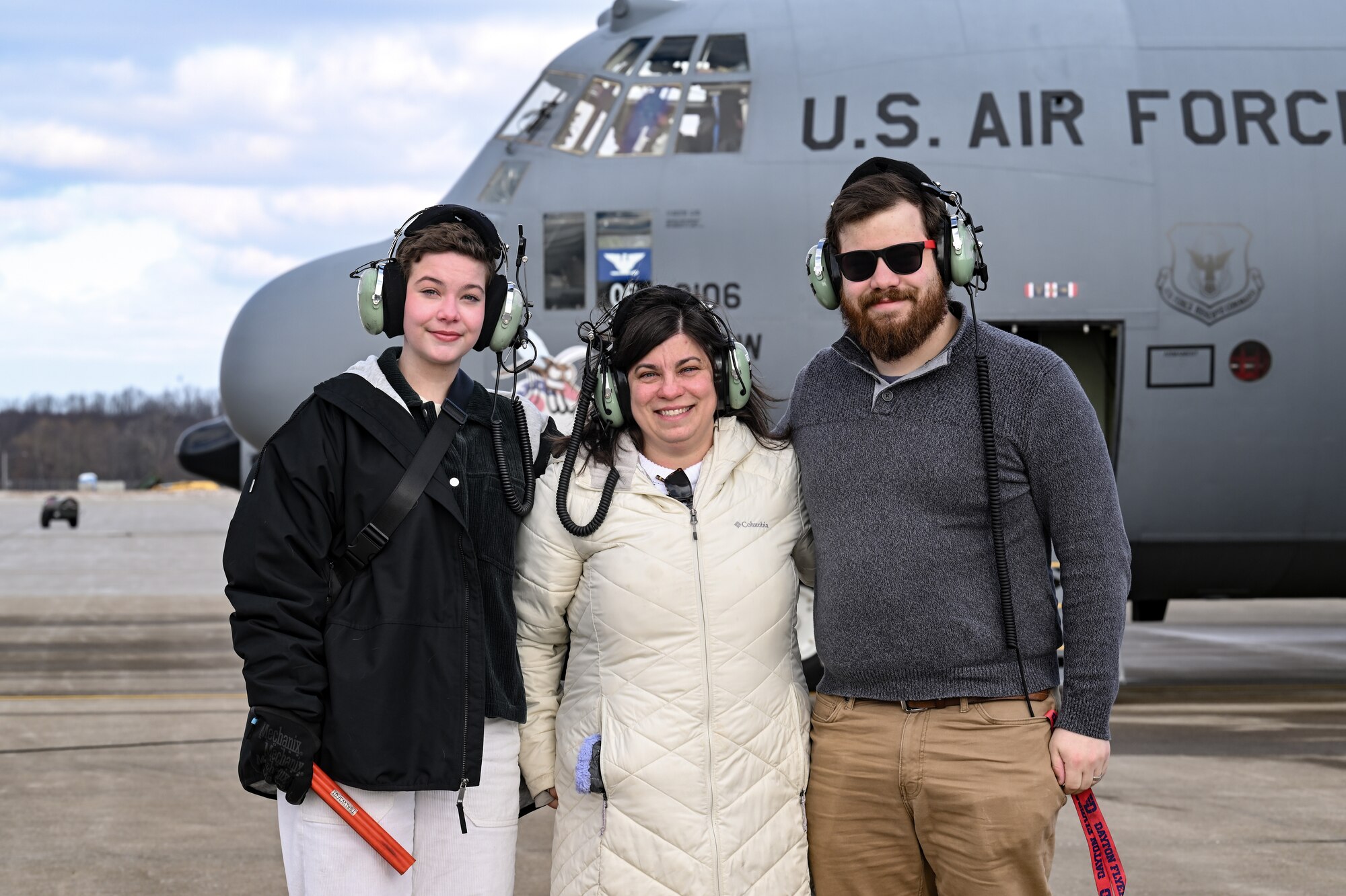 Family of Col. Michael Maloney, 910th Airlift Wing commander, pose for a photo as he conducts preflight operations prior to taking off for his “fini-flight” at Youngstown Air Reserve Station, Ohio, March 2, 2025.