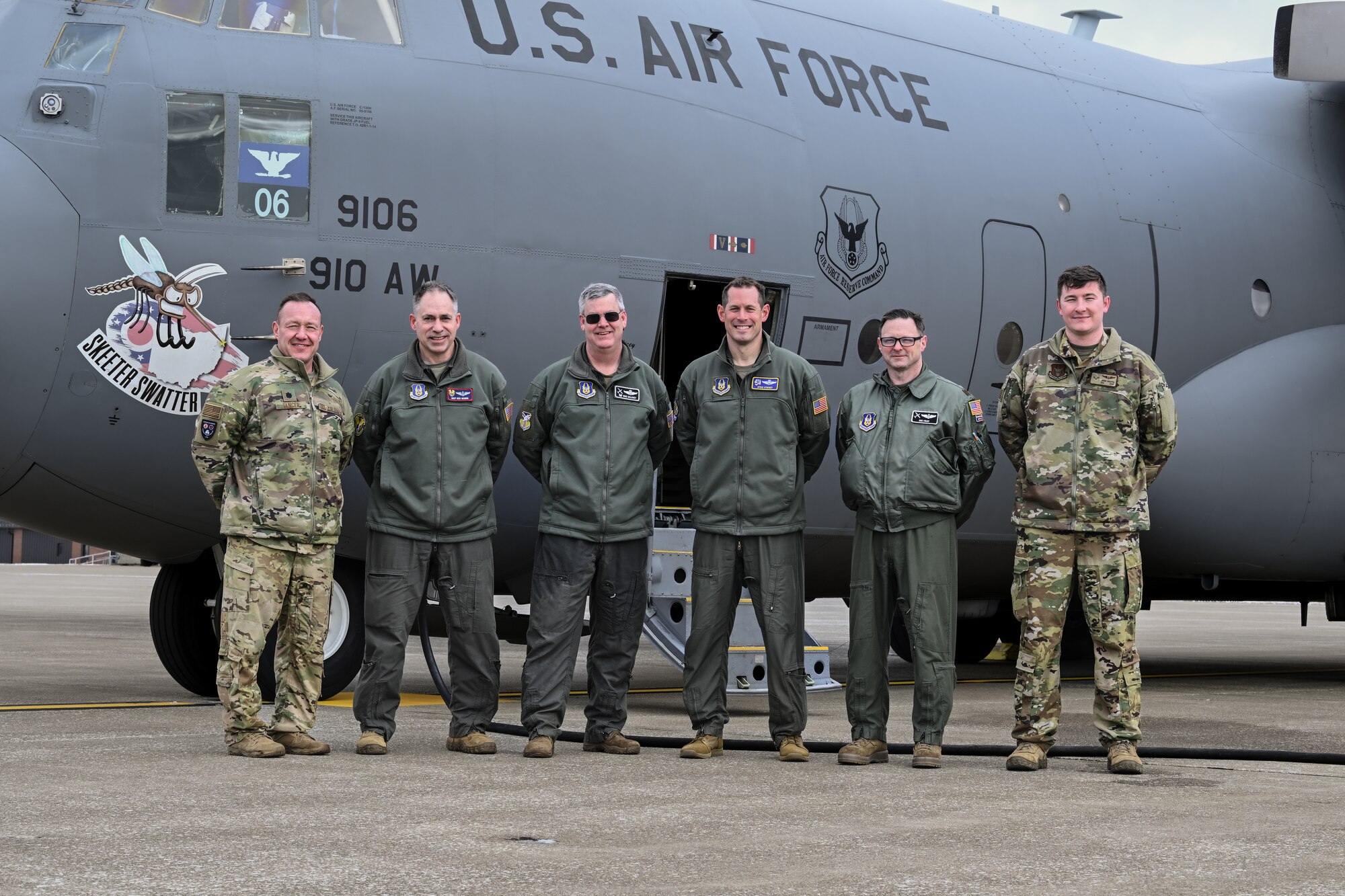 Col. Michael Maloney, 910th Airlift Wing commander, poses for a photo with aircrew members after landing from his “fini-flight” at Youngstown Air Reserve Station, Ohio, March 2, 2025.