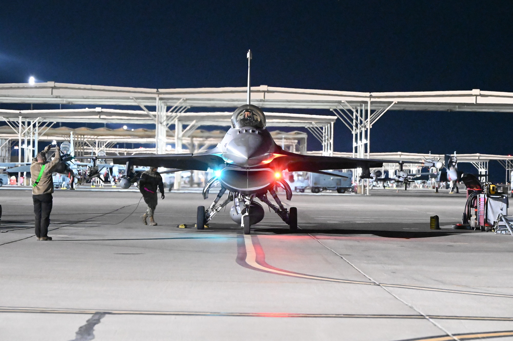 A U.S. Air Force F-16 Fighting Falcon assigned to the 706th Aggressor Squadron, Nellis Air Force Base (AFB), Nevada, prepares for a night mission during Red Flag-Nellis 25-1, Jan. 30, 2025, at Nellis AFB, Nevada.