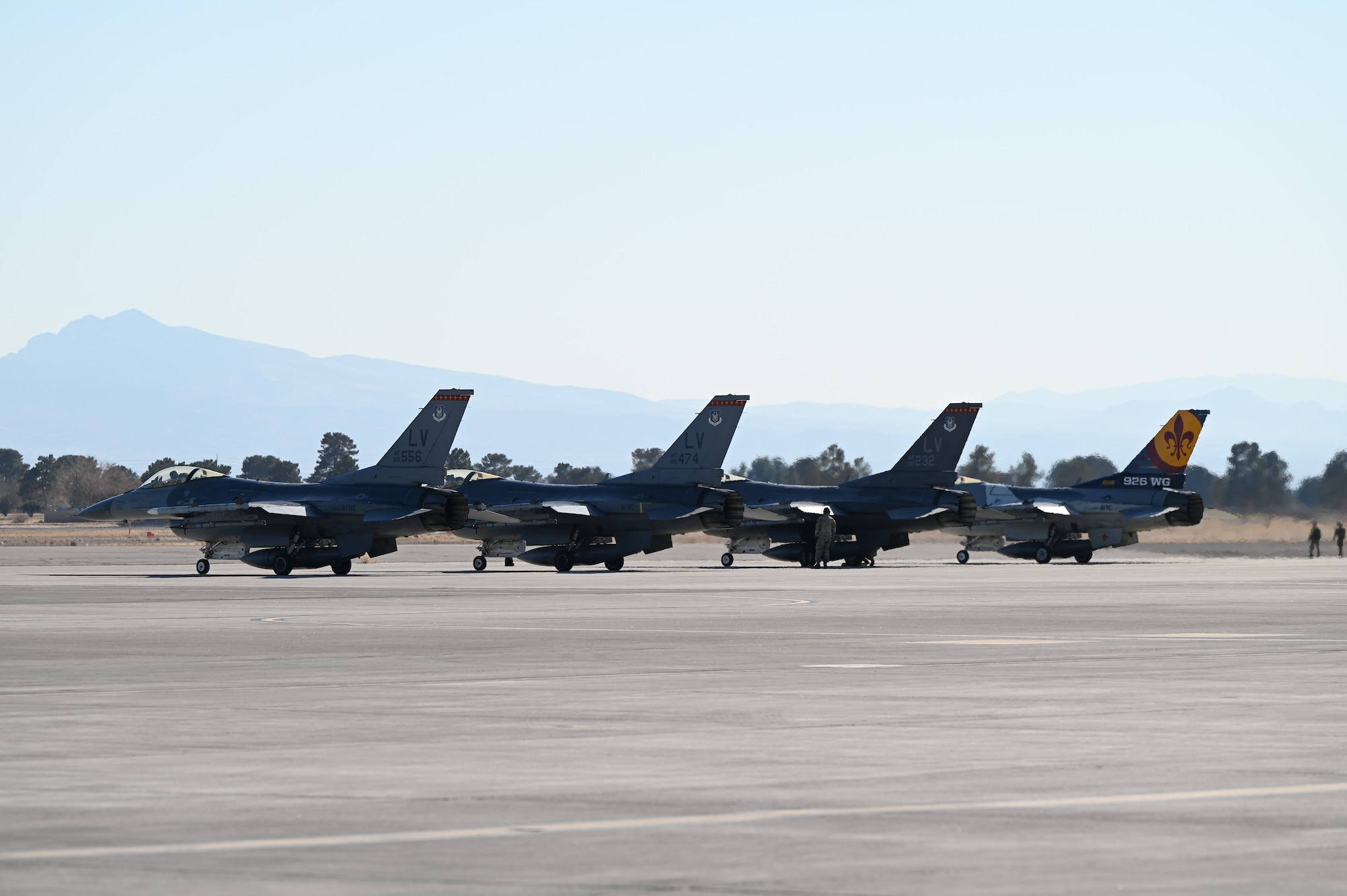 U.S. Air Force F-16 Fighting Falcons assigned to the 706th Aggressor Squadron, Nellis Air Force Base (AFB), Nevada, are staged on the flightline during Red Flag-Nellis 25-1, Jan. 29, 2025, at Nellis AFB, Nevada
