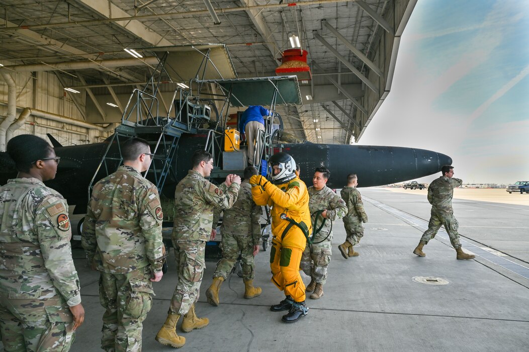 U.S. Air Force Lt. Gen. Thomas Hensley,

Commander, 16th Air Force (Air Forces

Cyber), greets maintainers at Beale Air

Force Base, California, Feb. 21, 2025.