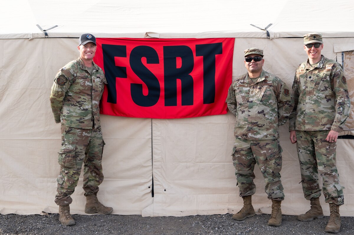 (From left to right) Capt. Jacob Thoman, 162nd Wing Liasion Officer for Nevada Chemical, Biological, Radiological, Nuclear Enhanced Response Force Package Sustainment Year Combined Training Event; Chief Master Sgt. Raul Verdugo, Senior Enlisted Leader, 162nd Force Support Squadron; and Lt. Col. John Meyer, Commander, 162nd FSS gather for a photo at Nellis Air Force Base, Mar. 1, 2025. The 162nd FSRT trained to respond to a variety of national and state emergencies, demonstrating the 162nd Wing's commitment to mission-readiness and support for both federal and state operations. (U.S. Air National Guard photo by Tech. Sgt. Van Whatcott)
