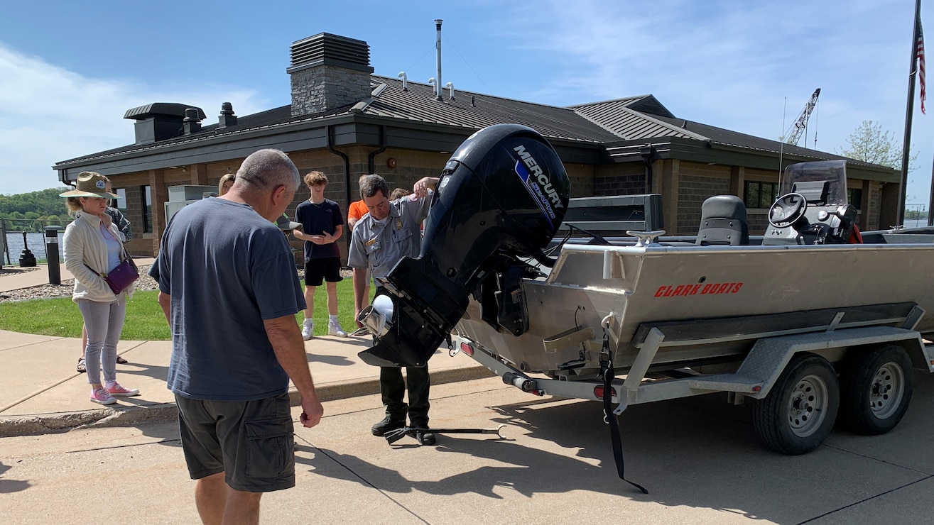 A park ranger demonstrates safe boat trailering practices during a boater safety course at the Mississippi River Project Office.