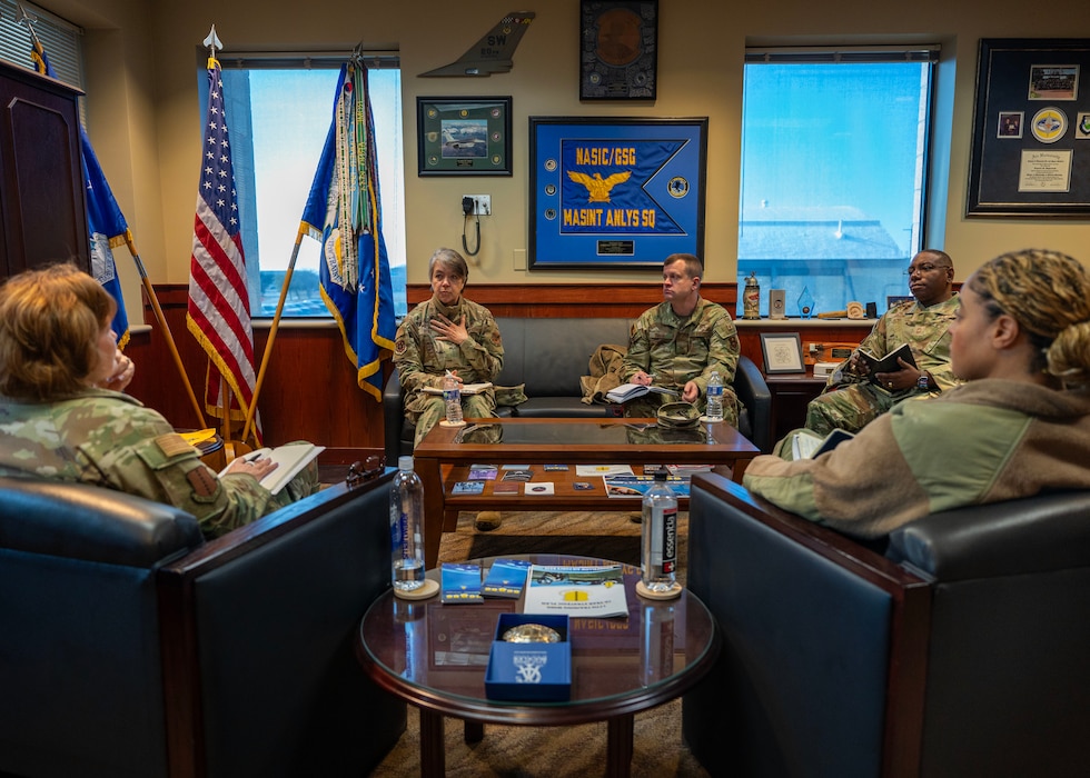 U.S. Air Force Col. Betty Venth, 359th Medical Wing commander, middle left, and Col. John Davis, Air Education and Training Command command surgeon, middle right, meet with Col. Angelina Maguinness, 17th Training Wing commander, left, and Chief Master Sgt. Khamillia Washington, 17th TRW command chief, right, during a visit at Goodfellow Air Force Base, Texas, Feb. 20, 2025. The visit offered insight into the medical services provided at Goodfellow and the precautions taken to help students reach the end of their course. (U.S. Air Force photo by Senior Airman Sarah Williams)