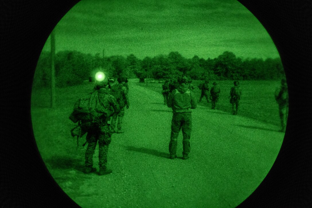 U.S. Marines with the 22nd Marine Expeditionary Unit (MEU) search for a simulated downed aircraft during an Expeditionary Operations Training Group (EOTG) exercise at Marine Corps Base Camp Lejeune, North Carolina, Feb. 10, 2025. The exercise focused on the procedures of tactical recovery of aircraft and personnel. EOTG trains II Marine Expeditionary Force units in preparation for upcoming deployments in support of geographic combatant commands. (U.S. Marine Corps photo by Lance Cpl. Kyle Baskin)