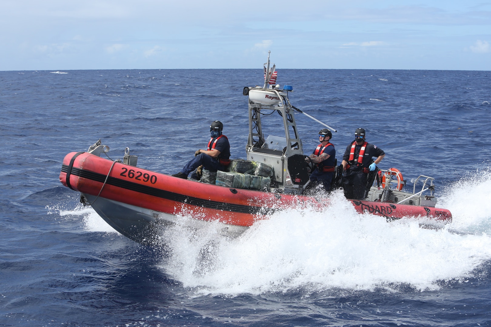 A USCGC Valiant (WMEC 621) law enforcement team is underway with interdicted narcotics approximately 50 miles northeast of the Dominican Republic, Feb. 17, 2025. U.S. Customs and Border Protection Air and Marine Operations aircrew detected the suspicious vessel and vectored in the Valiant crew who apprehended five suspected smugglers and seized approximately 1,280 pounds of cocaine. (U.S. Coast Guard photo by Seaman Reese Fishbaugh)