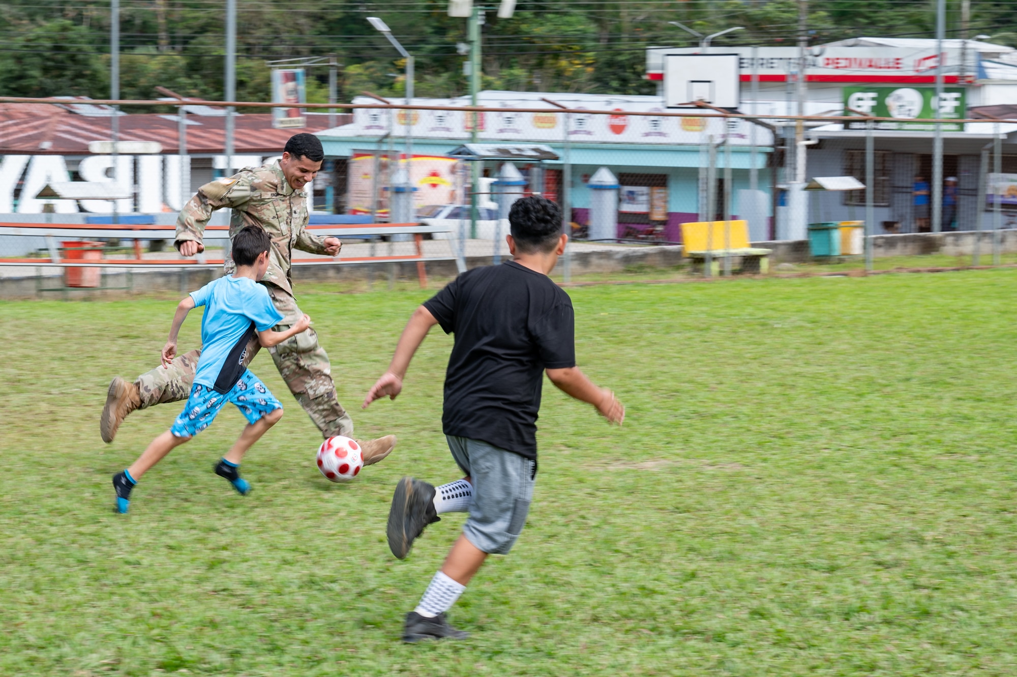 U.S. Army Spc. Jaden King, Joint Task Force-Bravo 349th Medical Detachment medic, plays soccer with local children during a Medical Readiness Training Exercise in Pejibaye, Costa Rica, February 25, 2025.