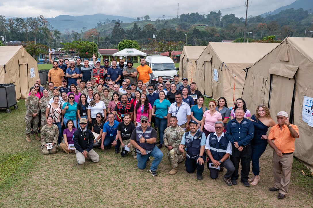 Joint Task Force-Bravo, Costa Rica Emergency Medical Team, and local community members pose for a group photo after a Medical Readiness Training Exercise in Pejibaye, Costa Rica, February 27, 2025.
